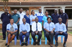 A group photo of all our staff members in 2024 at our centre in Wakaliga.